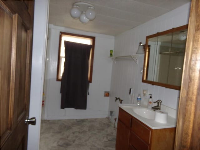 bathroom featuring vanity and walk in shower