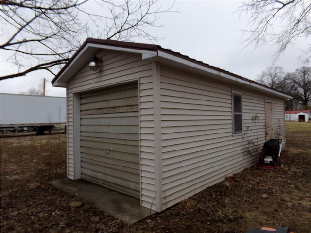 view of outbuilding featuring a garage