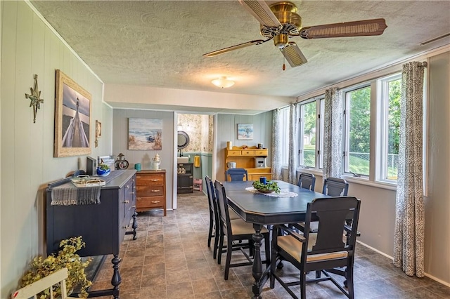 37 Ohio Dr, Decatur, IL 62526 - dining area featuring a ceiling fan and a textured ceiling