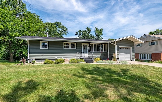 37 Ohio Dr, Decatur, IL 62526 - view of front of house with an attached garage, a front yard, and driveway