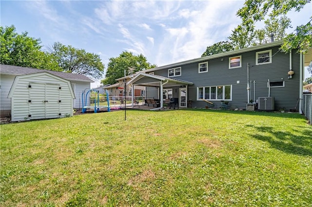 37 Ohio Dr, Decatur, IL 62526 - back of property featuring a storage shed and a patio