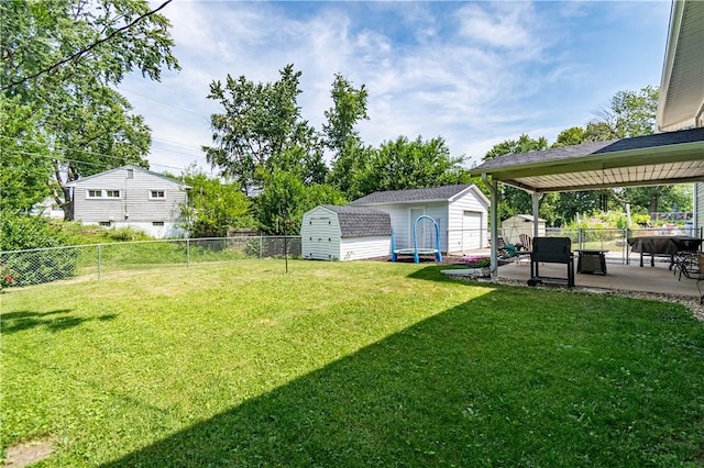 37 Ohio Dr, Decatur, IL 62526 - fenced backyard featuring a storage shed and a patio area