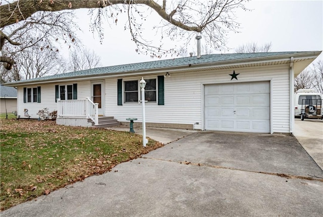 ranch-style house with a front yard and a garage