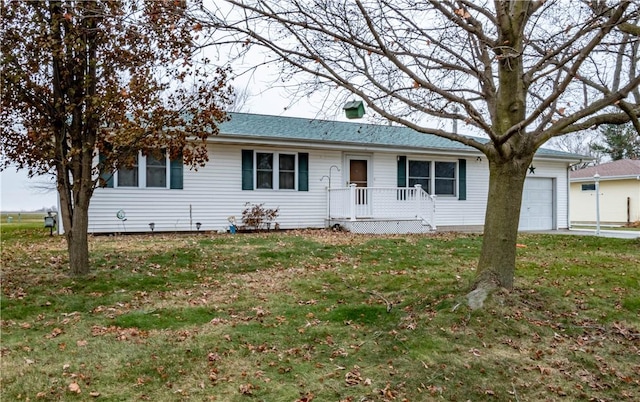 ranch-style house with a front lawn and a garage