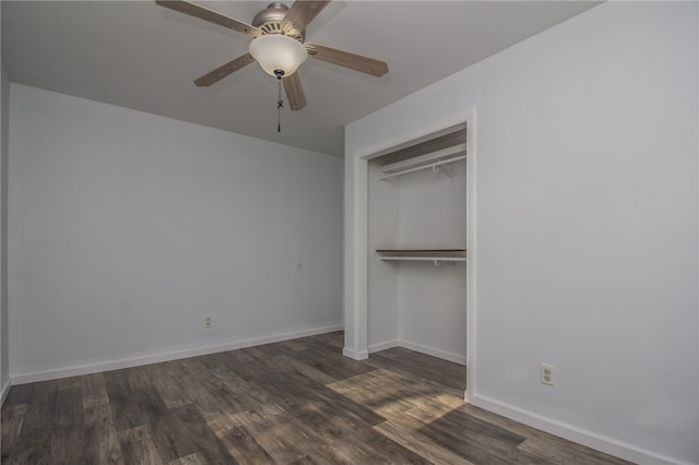 unfurnished bedroom with a closet, ceiling fan, and dark hardwood / wood-style flooring