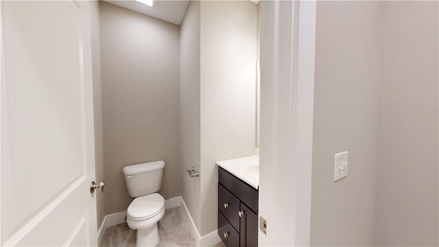 3006 E Stillwater Lndg, Urbana, IL 61802 - half bath with vanity, toilet, and baseboards