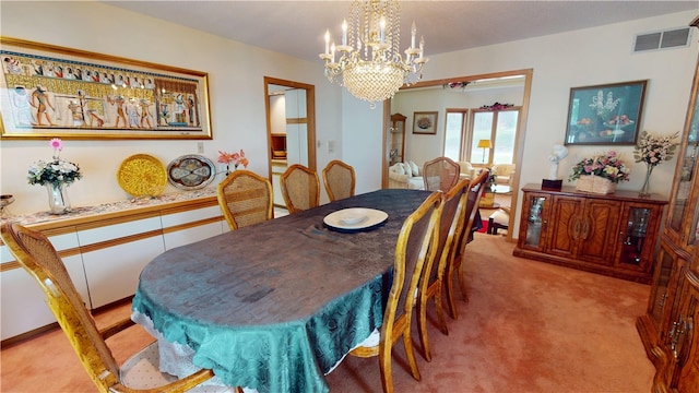10 Lakeshore Ct, Danville, IL 61832 - dining space with a chandelier and light carpet