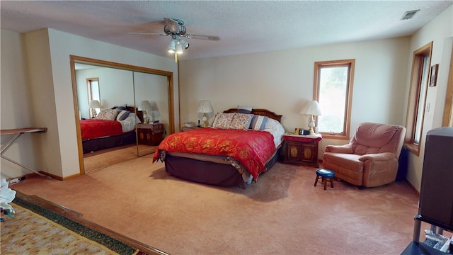 10 Lakeshore Ct, Danville, IL 61832 - carpeted bedroom featuring a closet and a ceiling fan