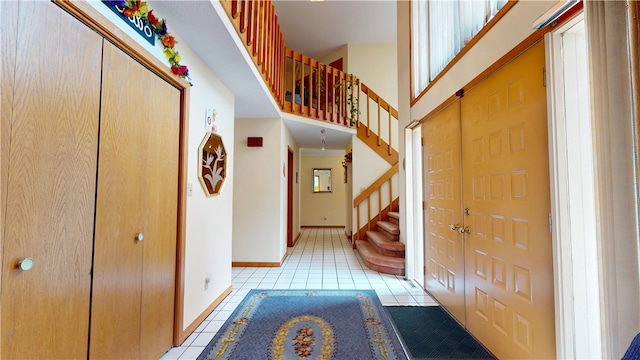 10 Lakeshore Ct, Danville, IL 61832 - entrance foyer featuring light tile patterned flooring and stairs