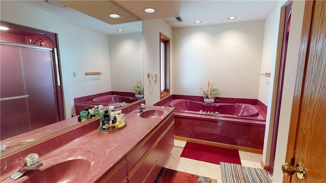 10 Lakeshore Ct, Danville, IL 61832 - full bath with a stall shower, a bath, double vanity, and recessed lighting