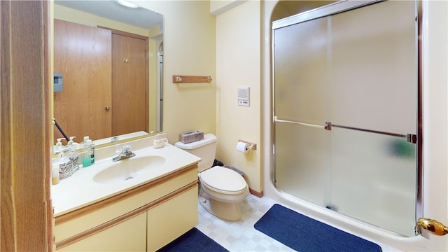 10 Lakeshore Ct, Danville, IL 61832 - full bathroom with vanity, a stall shower, and tile patterned floors