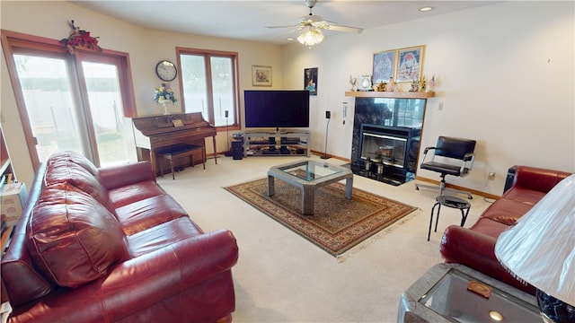 10 Lakeshore Ct, Danville, IL 61832 - carpeted living area with a fireplace and a ceiling fan