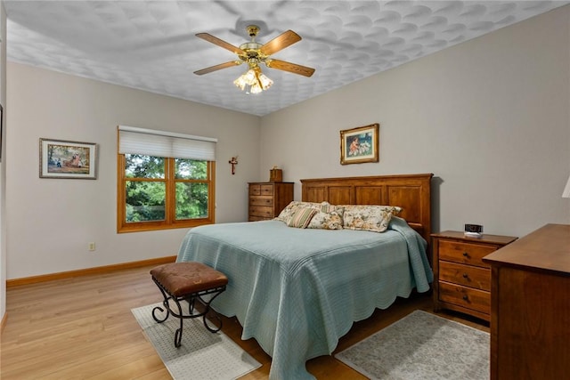 8434 Meadowview Rd, Effingham, IL 62401 - bedroom with light wood-type flooring and a ceiling fan
