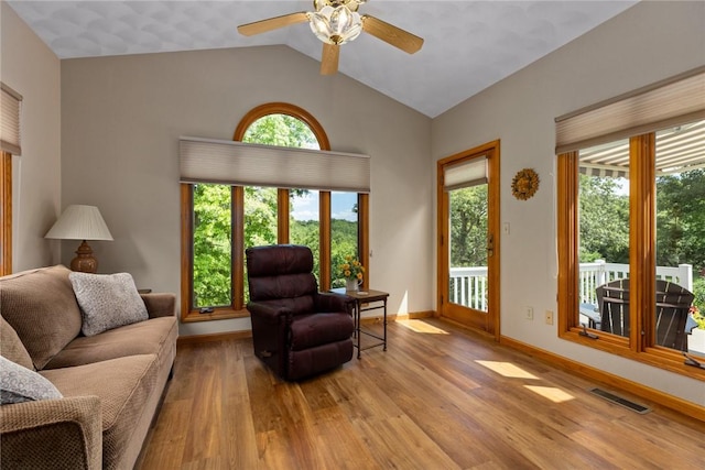 8434 Meadowview Rd, Effingham, IL 62401 - living area with lofted ceiling, ceiling fan, and wood finished floors
