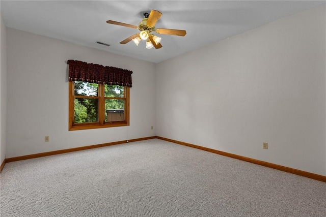 8434 Meadowview Rd, Effingham, IL 62401 - empty room with light colored carpet and ceiling fan