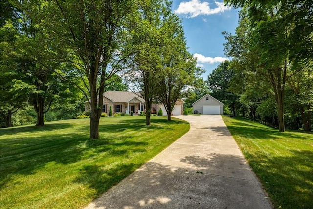 8434 Meadowview Rd, Effingham, IL 62401 - view of front of home featuring a front lawn, a garage, and an outdoor structure