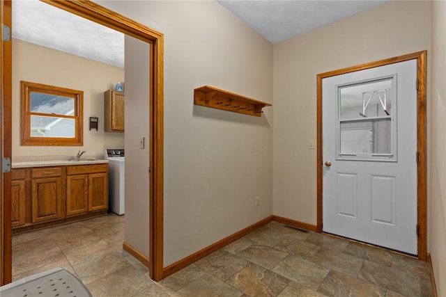 8434 Meadowview Rd, Effingham, IL 62401 - foyer with washer / clothes dryer and stone finish flooring
