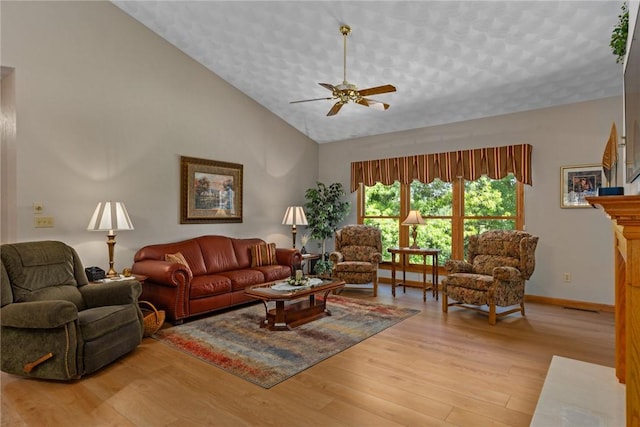 8434 Meadowview Rd, Effingham, IL 62401 - living room with a ceiling fan, wood finished floors, and high vaulted ceiling