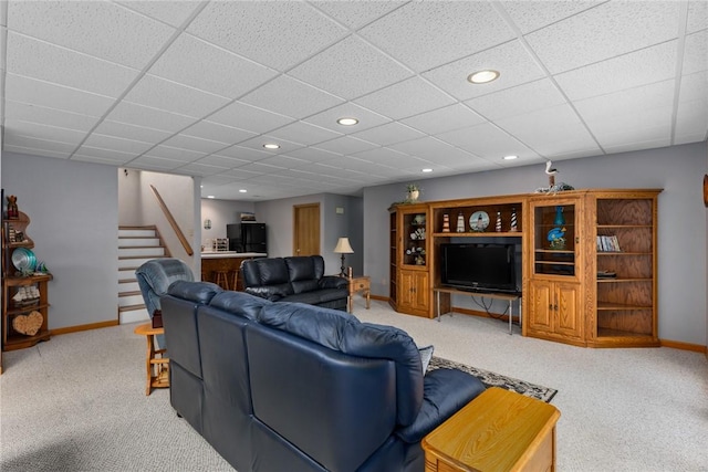 8434 Meadowview Rd, Effingham, IL 62401 - living area with light carpet, recessed lighting, stairs, and a paneled ceiling