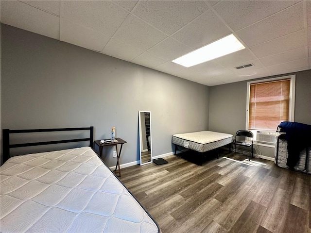 705 S 16th St, Mattoon, IL 61938 - bedroom with a paneled ceiling and wood finished floors