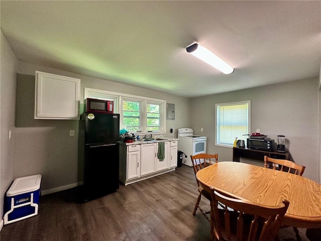 705 S 16th St, Mattoon, IL 61938 - kitchen with black appliances, white cabinets, dark wood-type flooring, electric panel, and light countertops