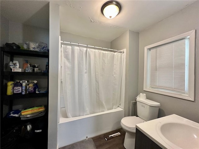 705 S 16th St, Mattoon, IL 61938 - bathroom featuring shower / bath combo with shower curtain, vanity, and wood finished floors