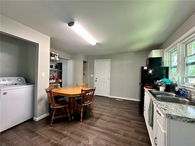 705 S 16th St, Mattoon, IL 61938 - dining space with washer / dryer and dark wood-type flooring