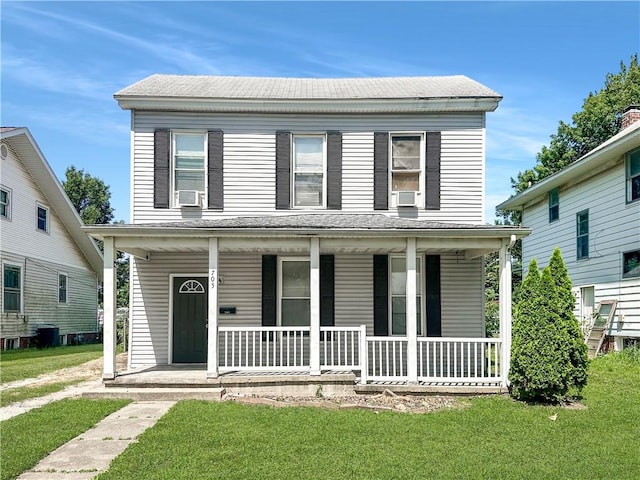 705 S 16th St, Mattoon, IL 61938 - view of front of home featuring a porch, a front yard, and cooling unit