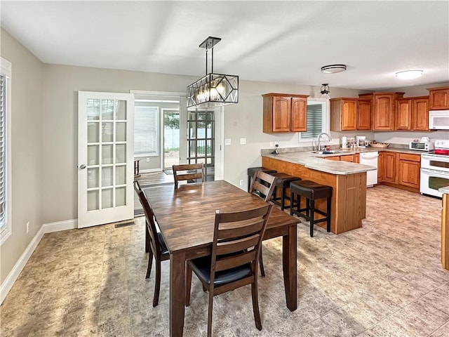 1113 Unique Ct, Mattoon, IL 61938 - dining room with baseboards