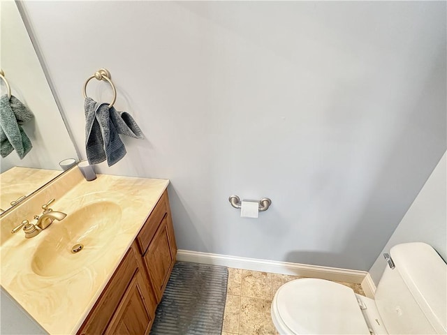 1113 Unique Ct, Mattoon, IL 61938 - half bath with toilet, vanity, baseboards, and tile patterned floors
