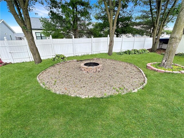 1113 Unique Ct, Mattoon, IL 61938 - view of yard featuring a fire pit