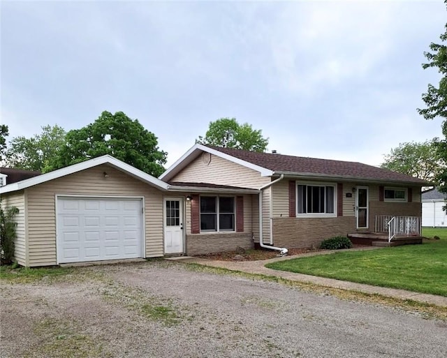 204 Bryan St, Catlin, IL 61817 - single story home with an attached garage, dirt driveway, and a front lawn
