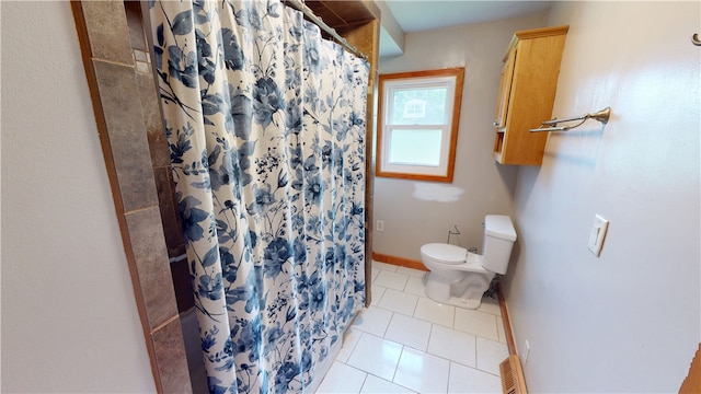 204 Bryan St, Catlin, IL 61817 - bathroom featuring toilet, tile patterned flooring, a shower with curtain, and baseboards