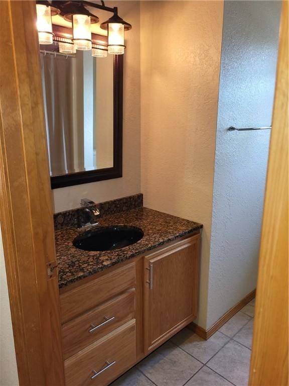 107 Edgewood Ave, Effingham, IL 62401 - bathroom with vanity, tile patterned floors, and a textured wall