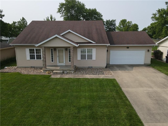 107 Edgewood Ave, Effingham, IL 62401 - ranch-style home featuring an attached garage, concrete driveway, a front lawn, covered porch, and a shingled roof