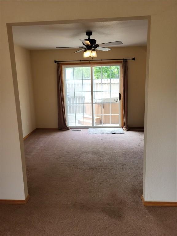 107 Edgewood Ave, Effingham, IL 62401 - unfurnished room with carpet and ceiling fan
