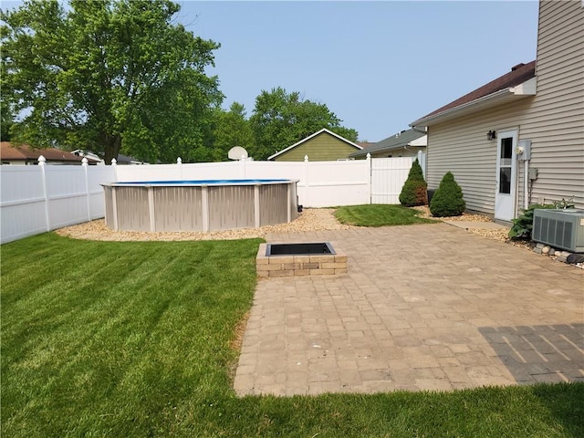 107 Edgewood Ave, Effingham, IL 62401 - fenced backyard with a patio area