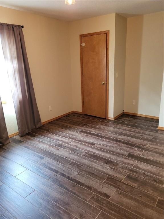 107 Edgewood Ave, Effingham, IL 62401 - spare room with dark wood finished floors