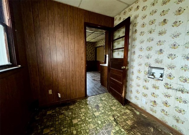 316 Plum St, Danville, IL 61832 - unfurnished room with wallpapered walls and wood walls
