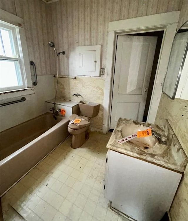 316 Plum St, Danville, IL 61832 - full bath featuring bathing tub / shower combination, wallpapered walls, vanity, and tile patterned floors
