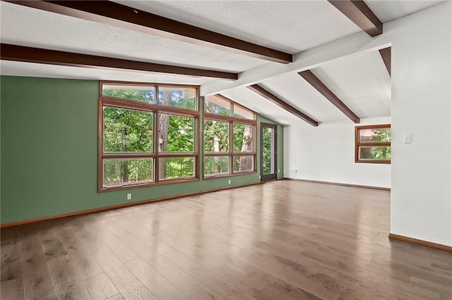 3044 Greenlake Dr, Decatur, IL 62521 - unfurnished living room with wood finished floors and a textured ceiling
