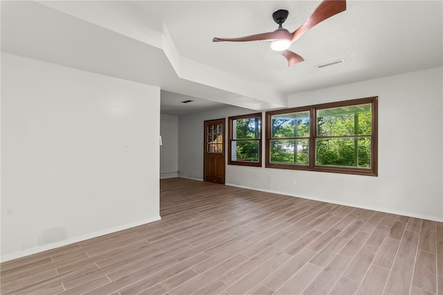3044 Greenlake Dr, Decatur, IL 62521 - empty room with light wood-style flooring and ceiling fan