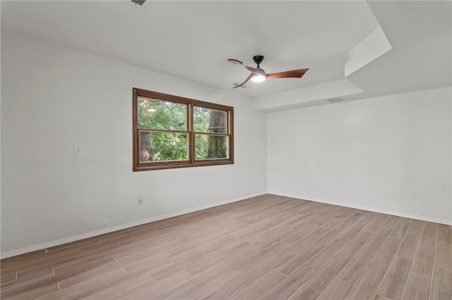 3044 Greenlake Dr, Decatur, IL 62521 - unfurnished room featuring light wood-type flooring and a ceiling fan