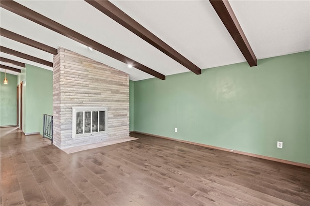 3044 Greenlake Dr, Decatur, IL 62521 - unfurnished living room featuring wood finished floors and a large fireplace