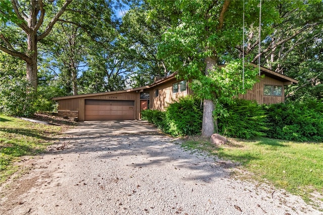 3044 Greenlake Dr, Decatur, IL 62521 - view of front of house with driveway and a garage