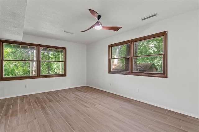 3044 Greenlake Dr, Decatur, IL 62521 - spare room featuring wood finished floors and ceiling fan