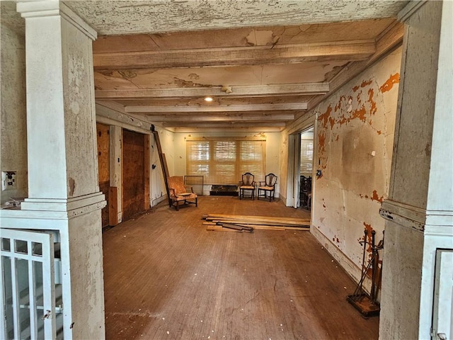 528 E Broadway St, Centralia, IL 62801 - misc room featuring wood-type flooring and beam ceiling