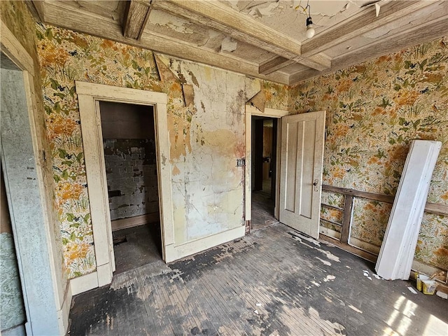 528 E Broadway St, Centralia, IL 62801 - empty room featuring coffered ceiling, beamed ceiling, and wallpapered walls