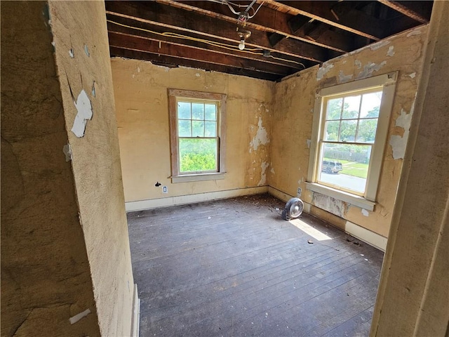 528 E Broadway St, Centralia, IL 62801 - empty room with healthy amount of natural light and wood-type flooring