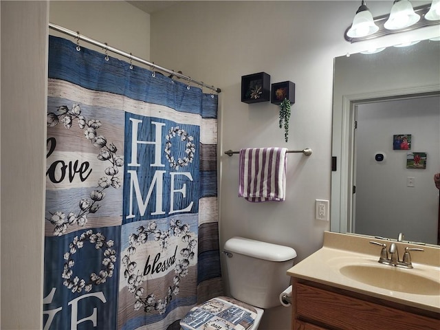 8 Courtyard Blvd, Sullivan, IL 61951 - bathroom with vanity, toilet, and curtained shower